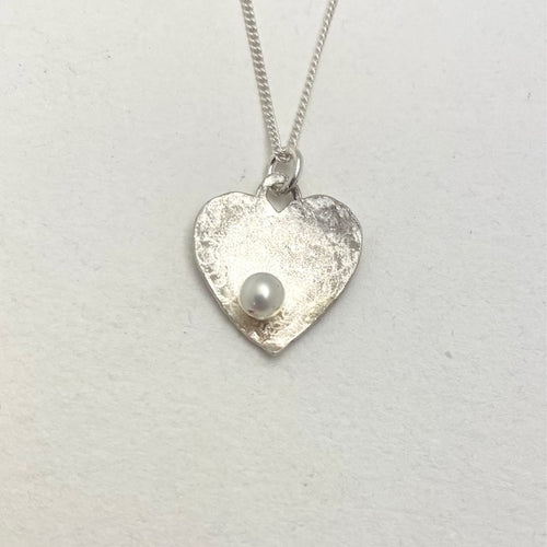 Silver heart with pearl necklace