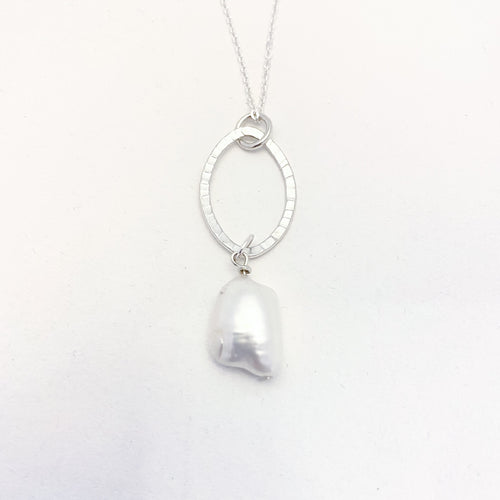 Silver Oval Ring and Baroque Pearl Necklace