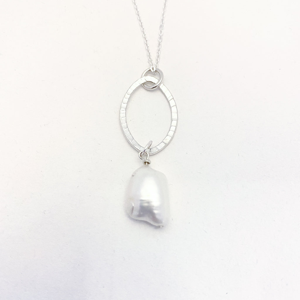 Silver Oval Ring and Baroque Pearl Necklace