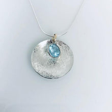 Load image into Gallery viewer, Scribbled Shell Disc with Blue Topaz Necklace